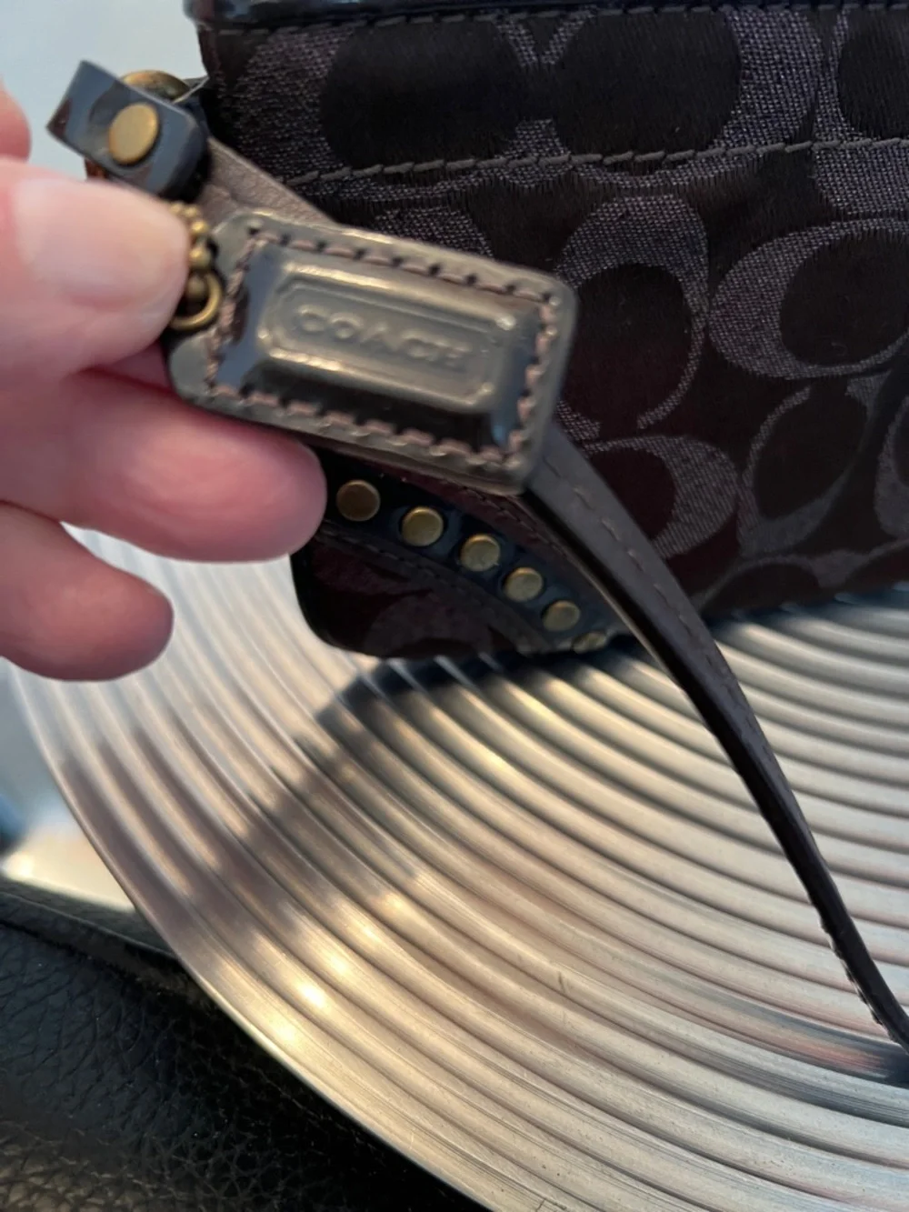 COACH EUC BROWN with BLACK PATENT WRISTLET